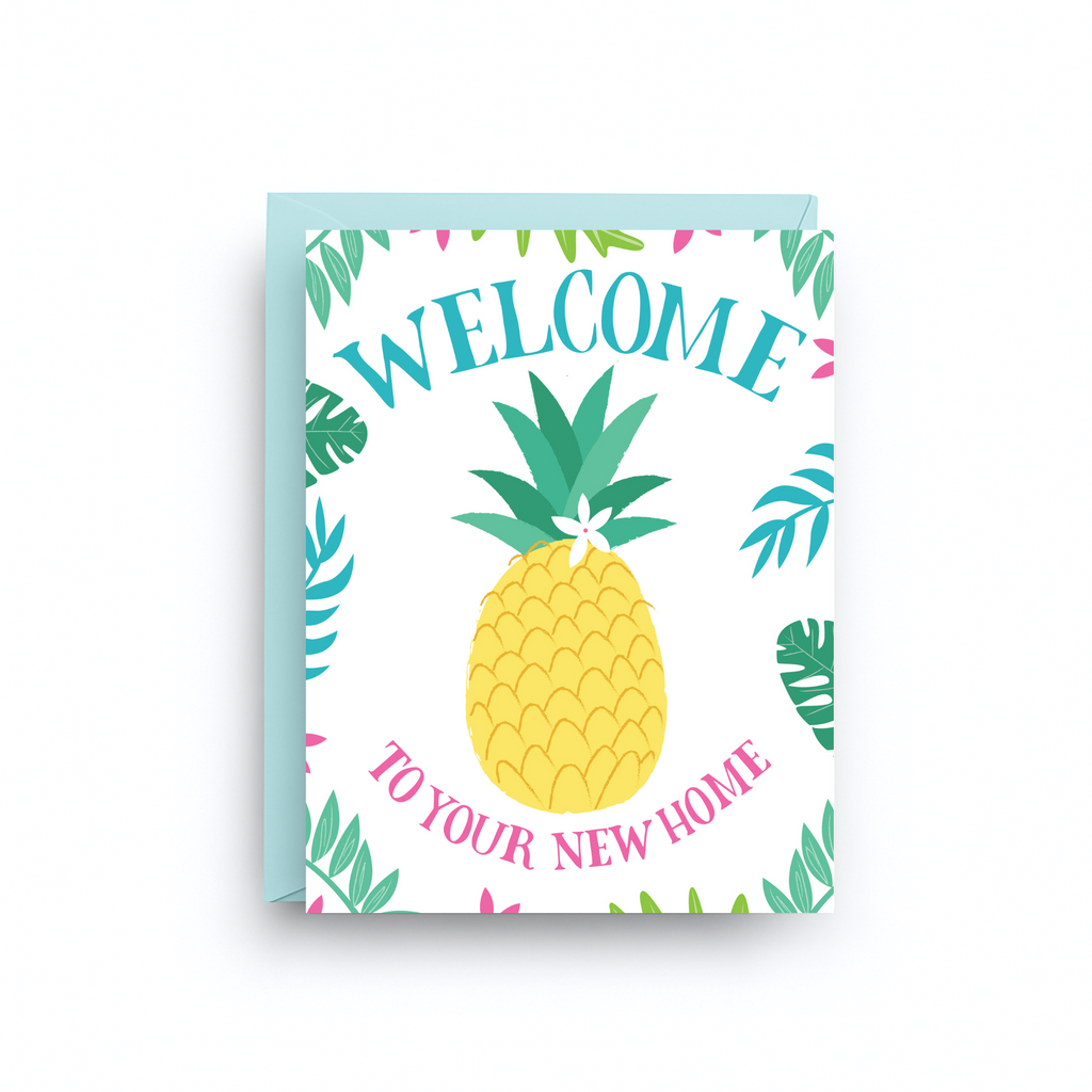 Greeting card with pineapple and 'Welcome to your new home' text on a white background