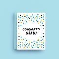 Graduation card with colorful dots and 'Congrats Grad!' text on a light blue background