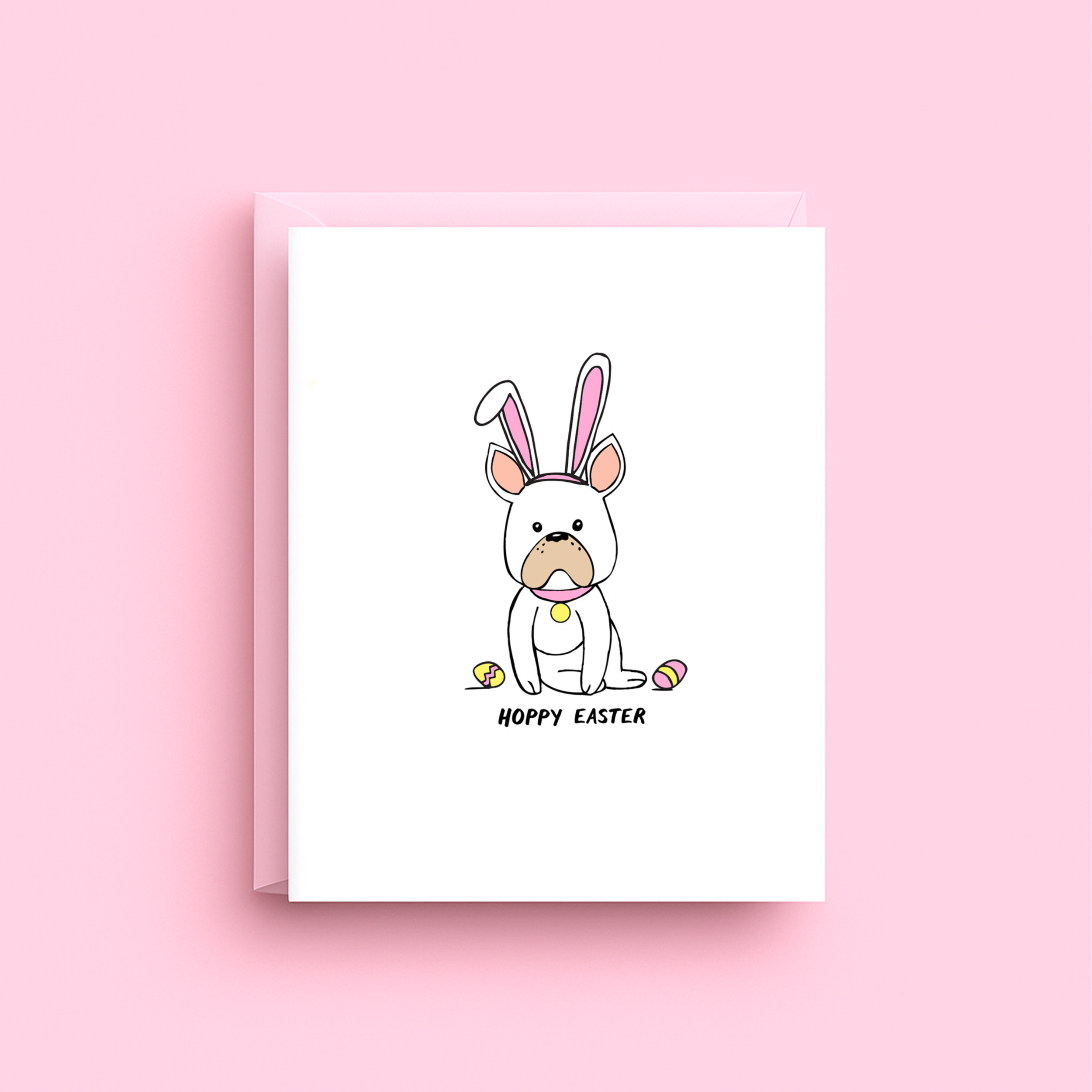 Greeting card with a dog wearing bunny ears on a pink background