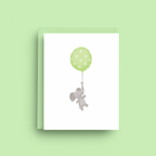 Card with a bear and green balloon on a light green background