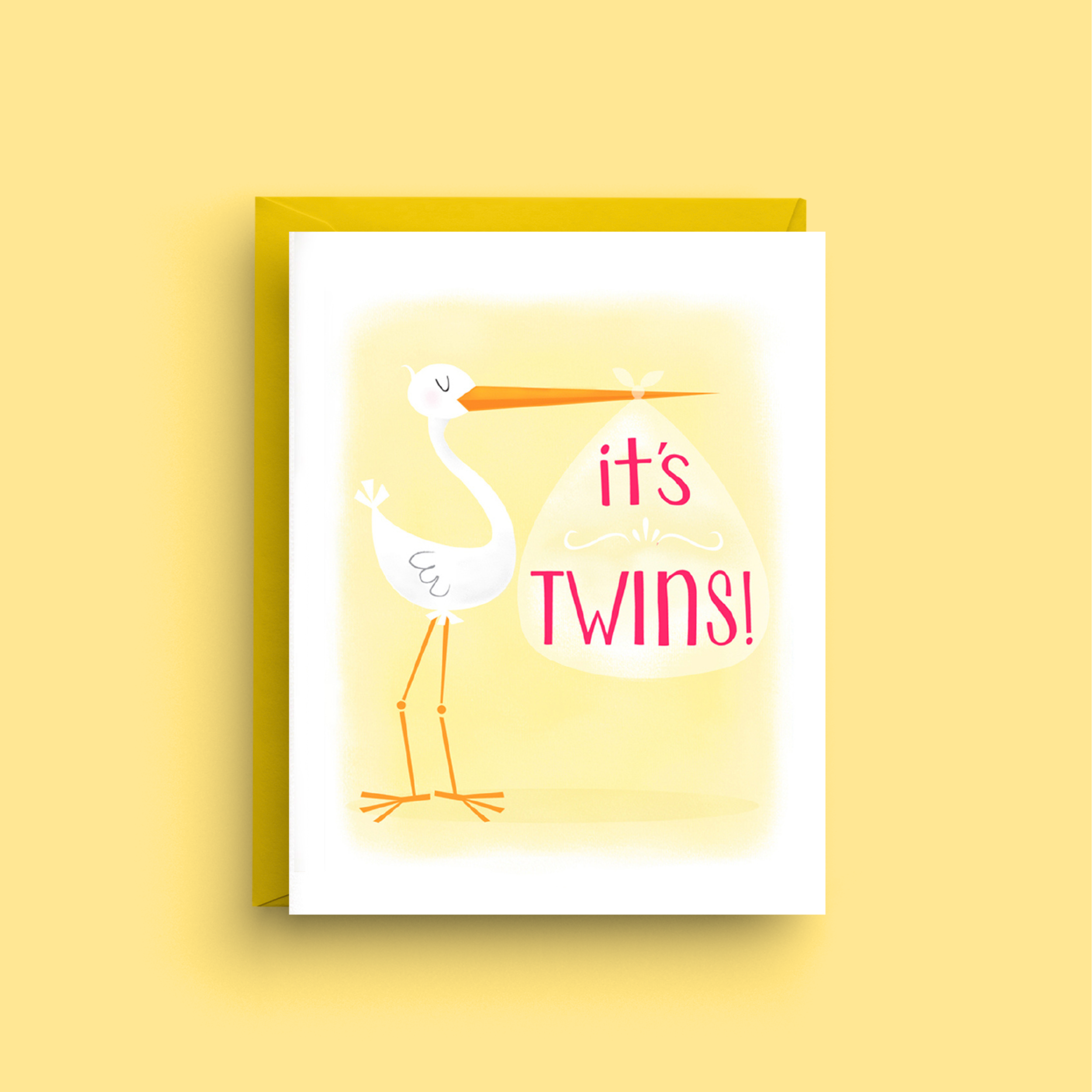 Greeting card with stork and 'it's twins!' text on a yellow background