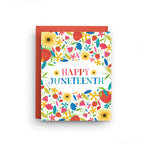 Greeting card with colorful floral design and 'Happy Juneteenth' text on a white background