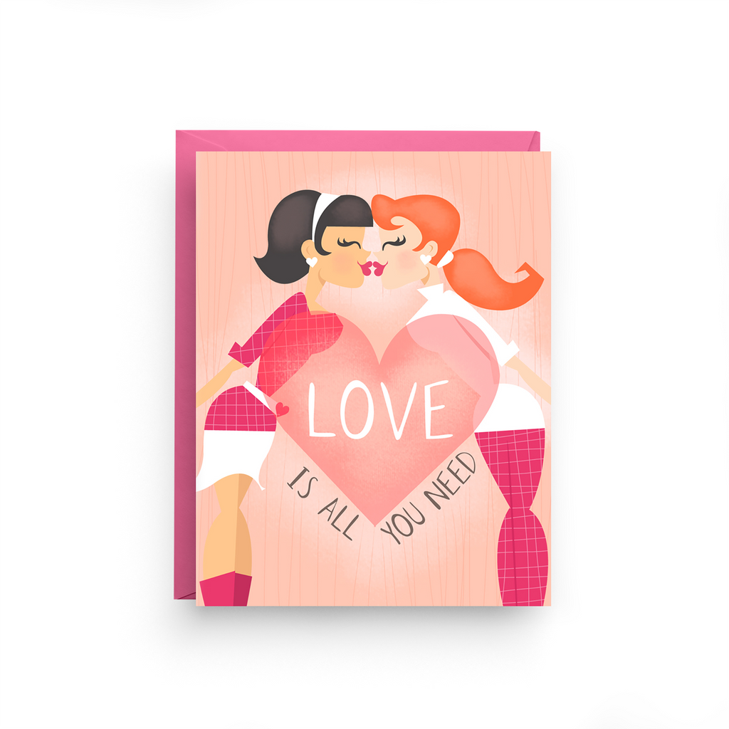 Card with two people holding a heart and 'Love is all you need' text on a pink background