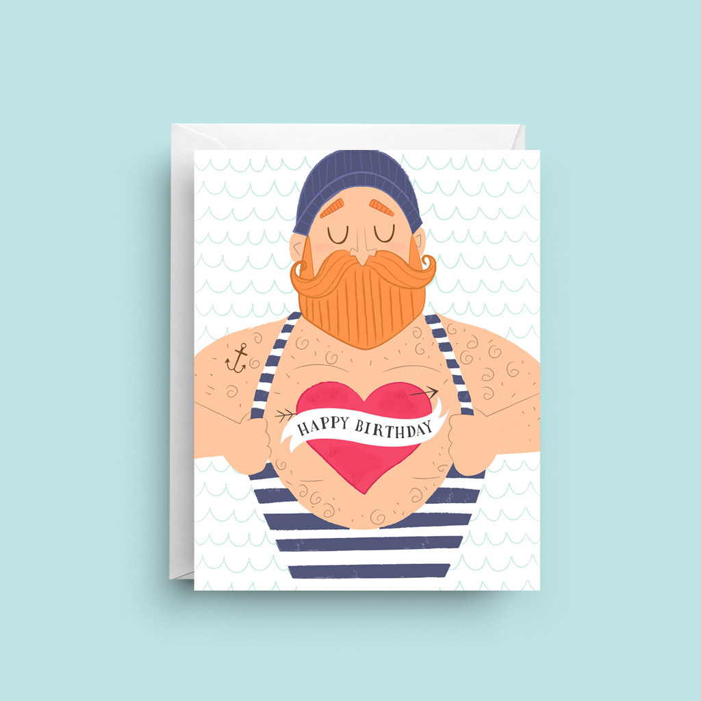 Birthday card with a cartoon man with a beard and tattoo on a light blue background