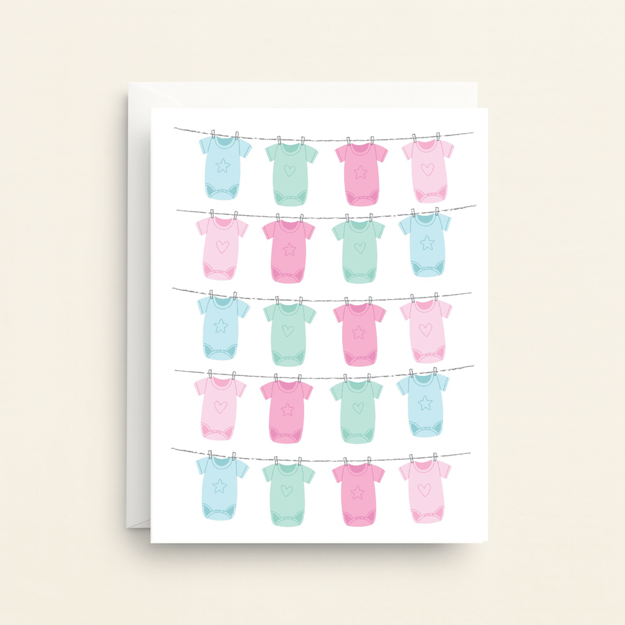 Card with illustrations of baby onesies on a clothesline against a white background
