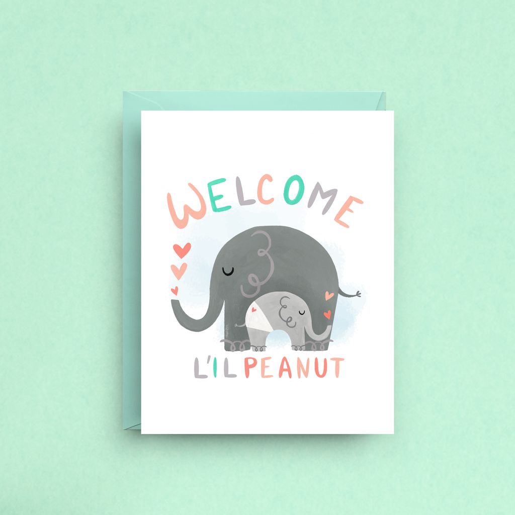 Greeting card with elephants and 'Welcome L'il Peanut' text on a light green background