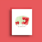 Greeting card with puzzle piece design on a red background