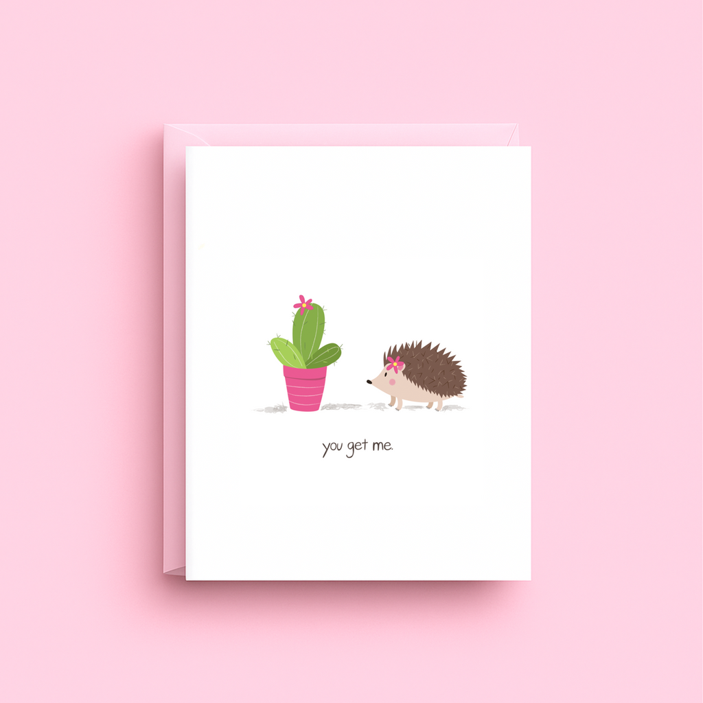 Greeting card with a hedgehog and cactus illustration on a pink background